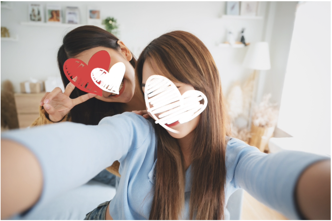 BeautyPlusのハートスタンプで顔を隠した画像